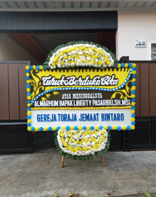Papan Bunga Duka di Tanah Pinem